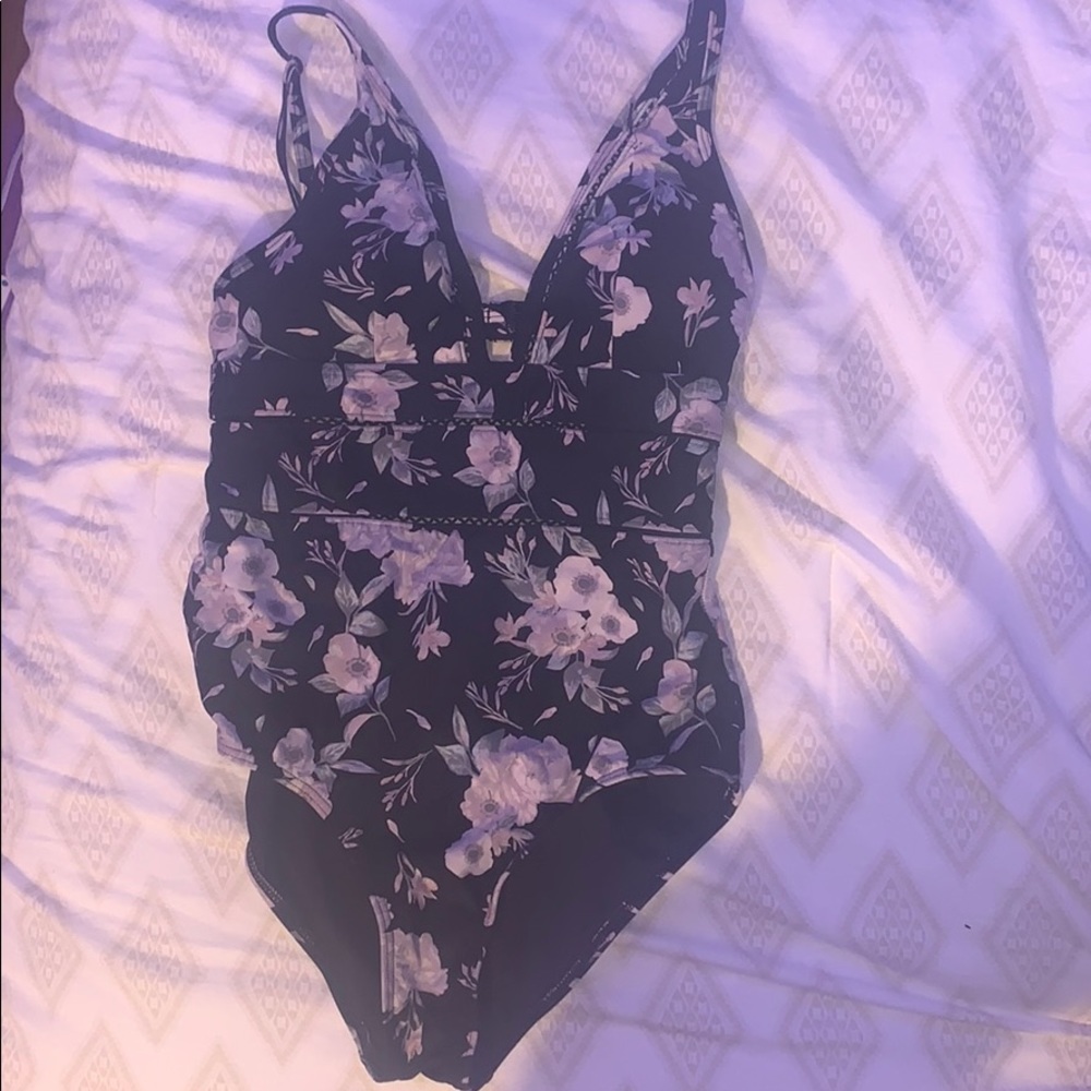 One piece floral bathing suit.